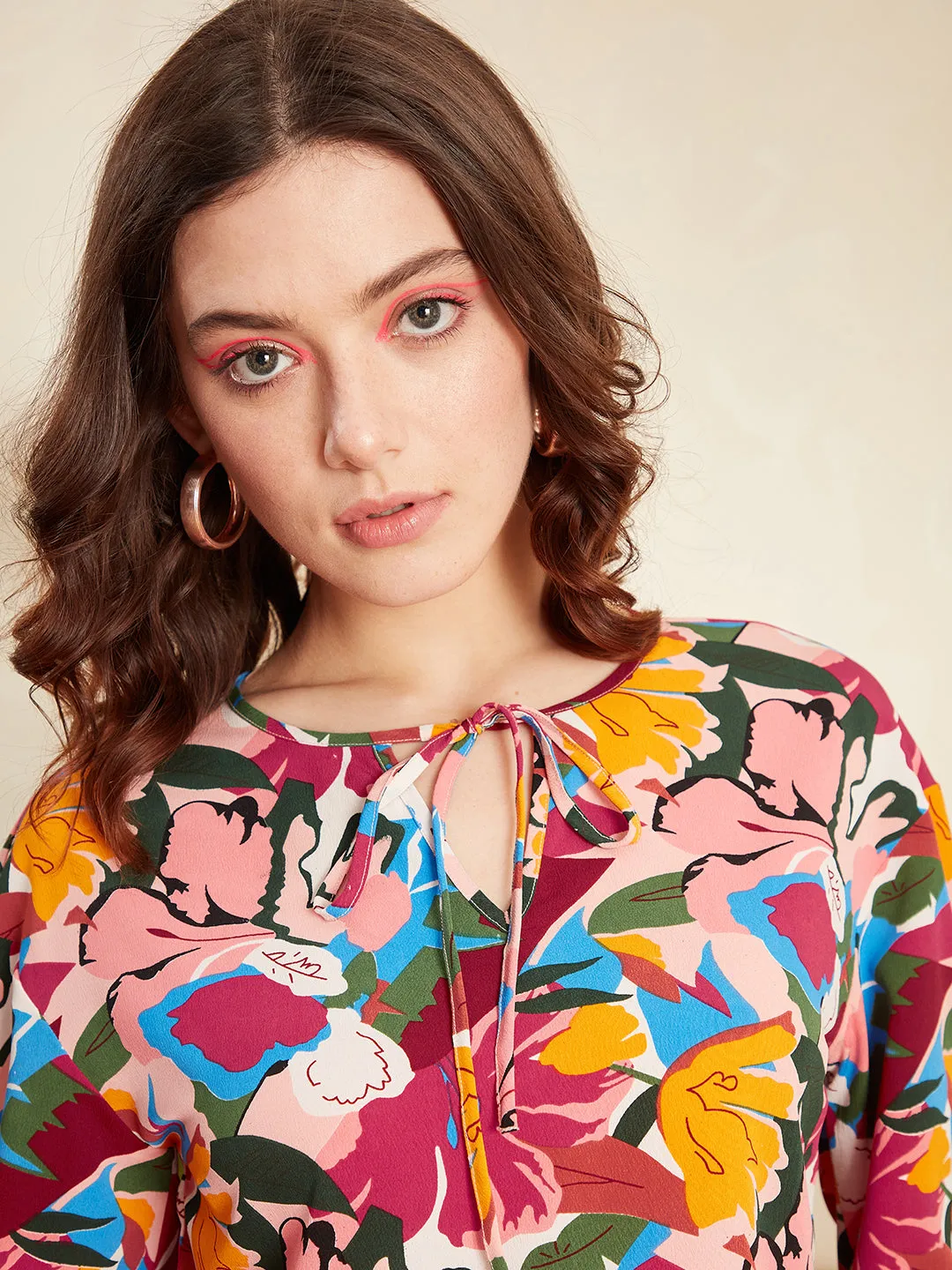 Berrylush Women Multicolour Floral Printed Tie-Up Neck Slip-On Curved Hem Regular Top